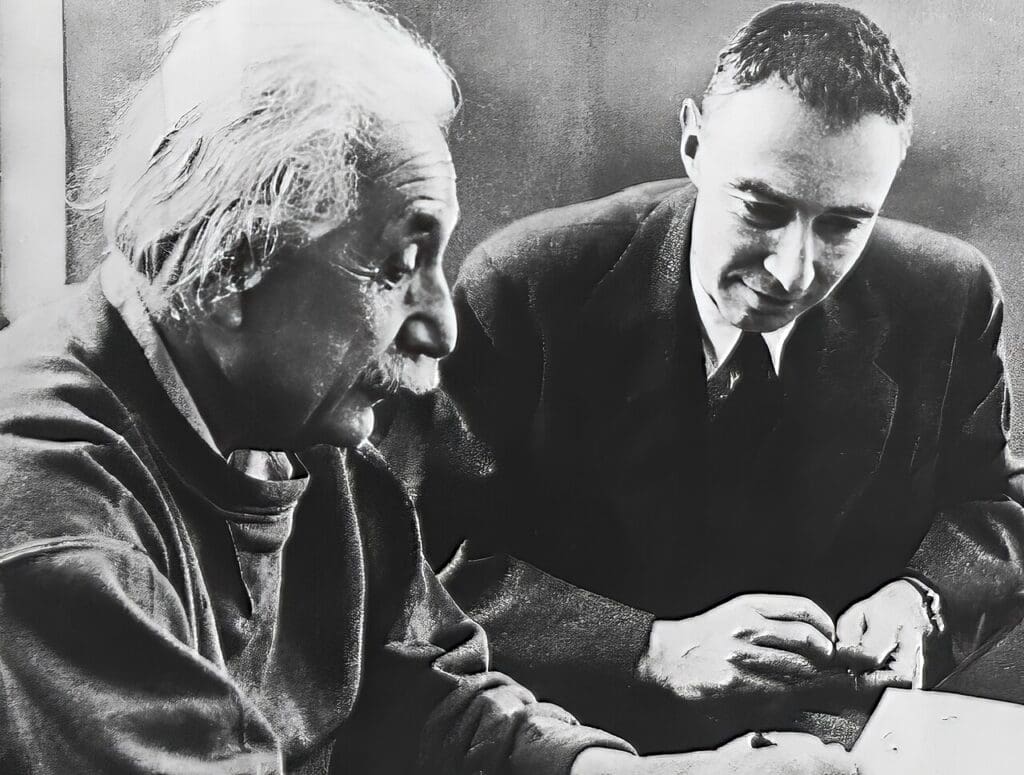Albert Einstein and Robert Oppenheimer in a posed photograph at the Institute for Advanced Study (1950).